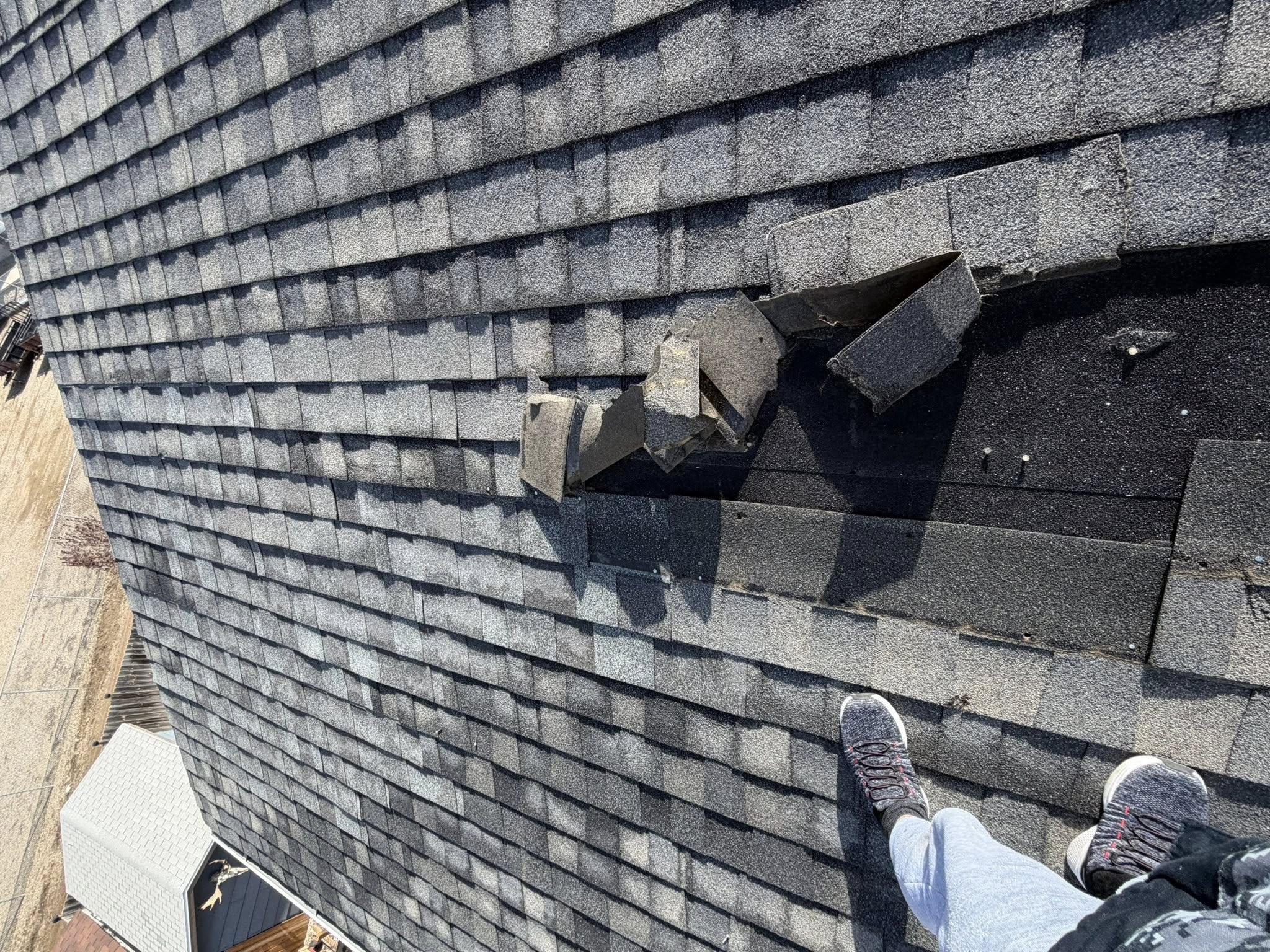 Roof damage before repair work